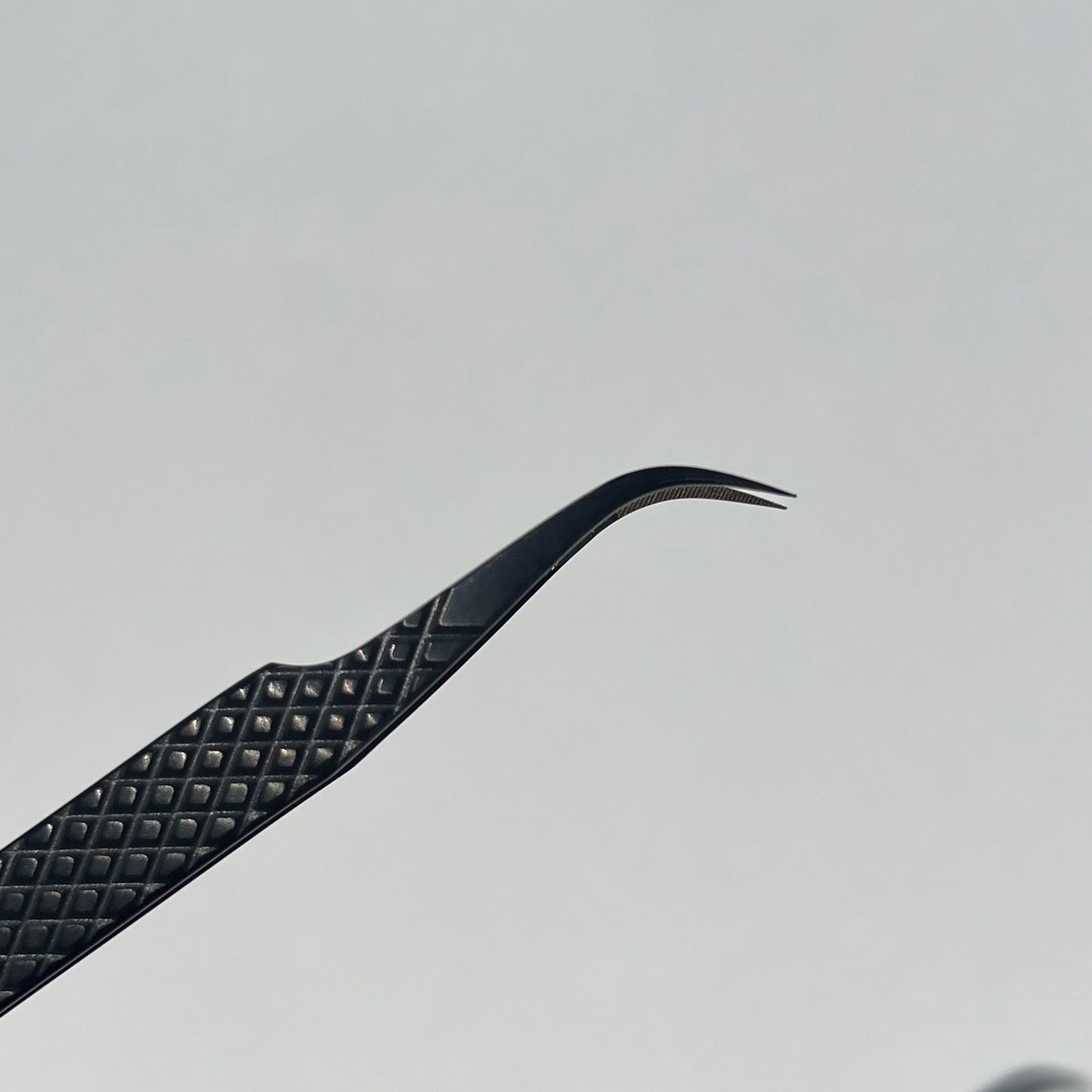 J curve Black fiber tip tweezer