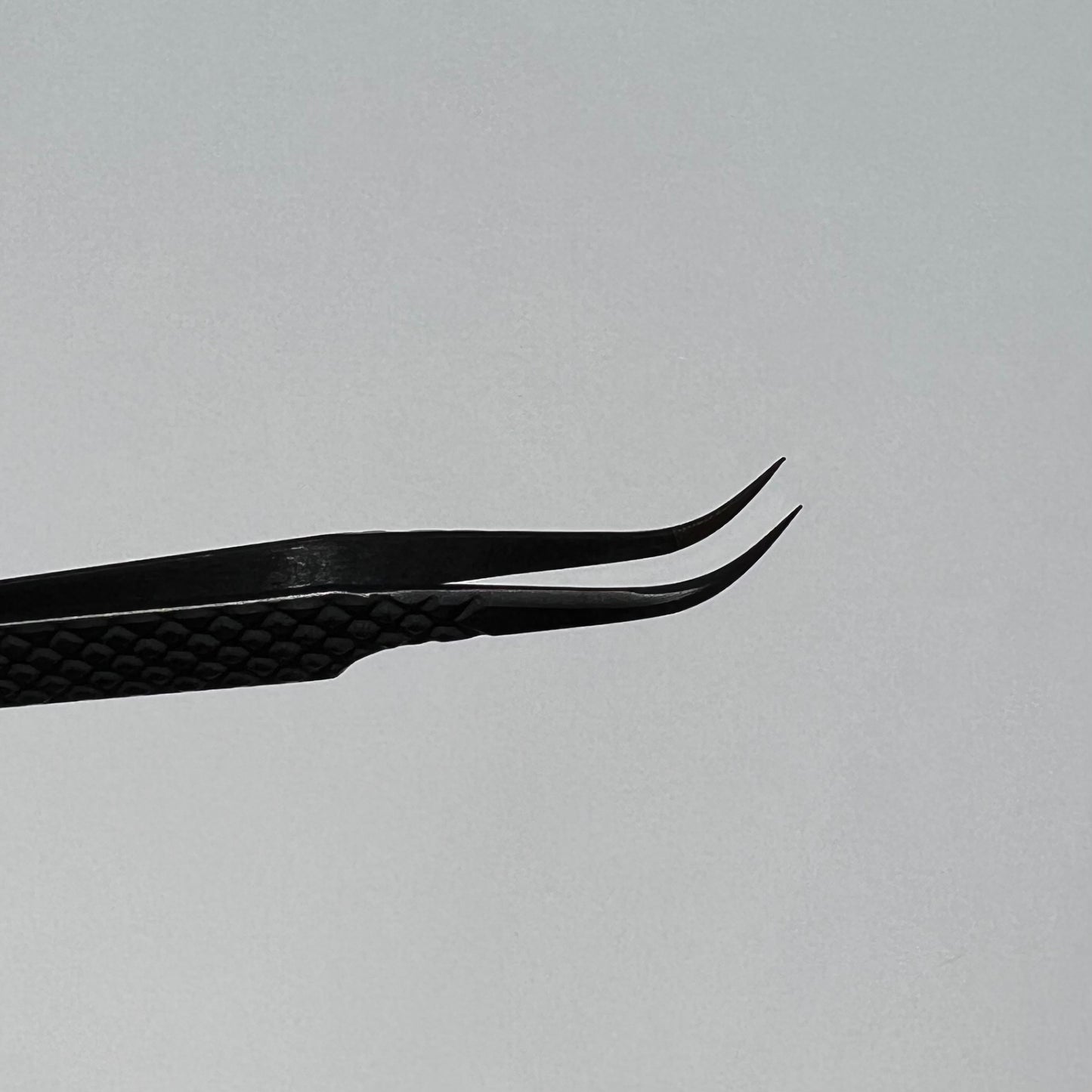 J curve Black fiber tip tweezer